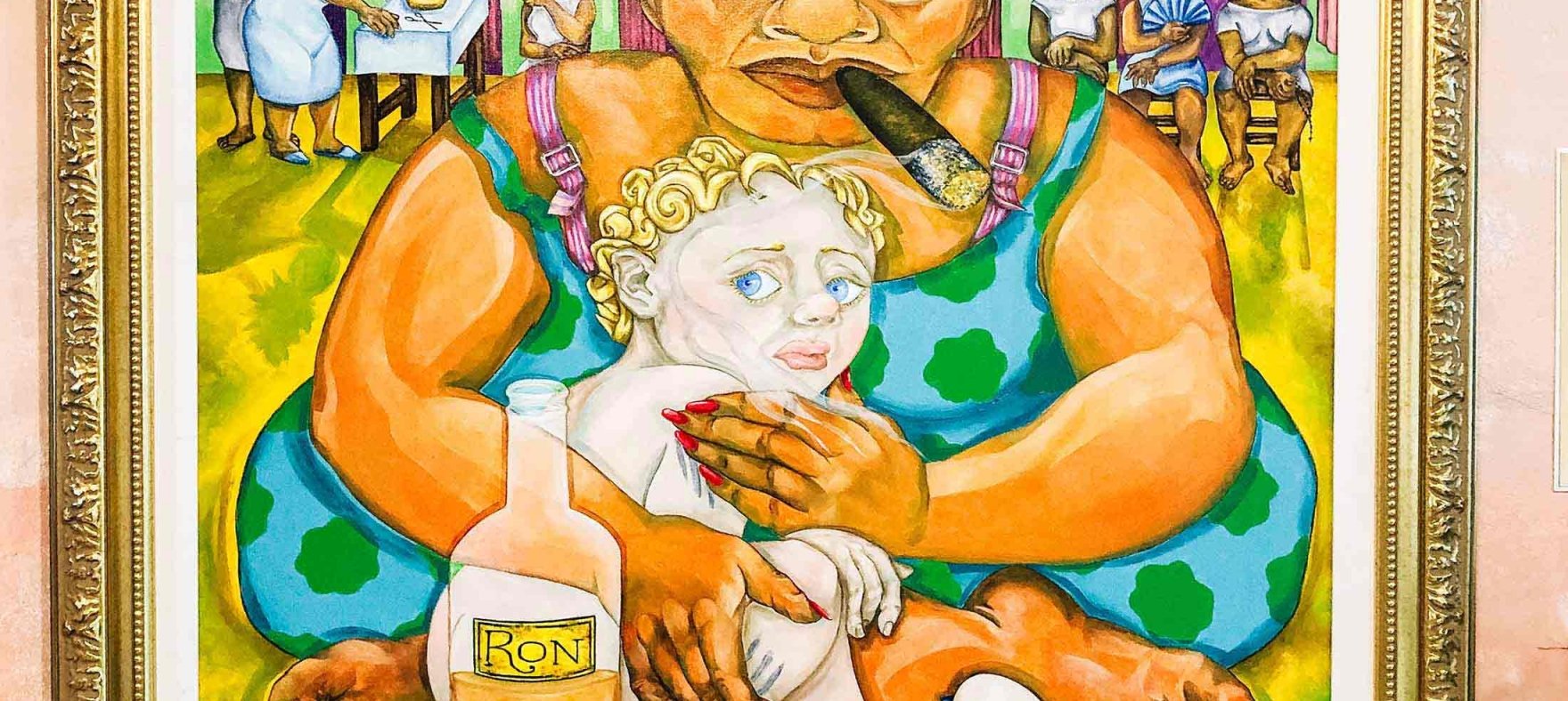 A close focus on the art of a woman smoking a cigar as she holds a fearful child in her arms next to a rum bottle and glass
