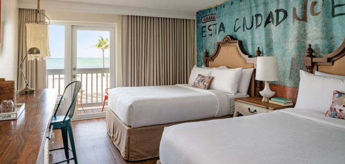 Interior view of a two Queens bedroom at Havana Cabana resort.