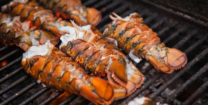 Lobster tails on a grill